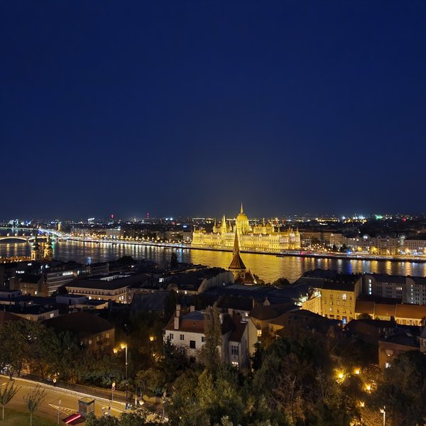 Budapest at night with the Parliament lit up over the Danube