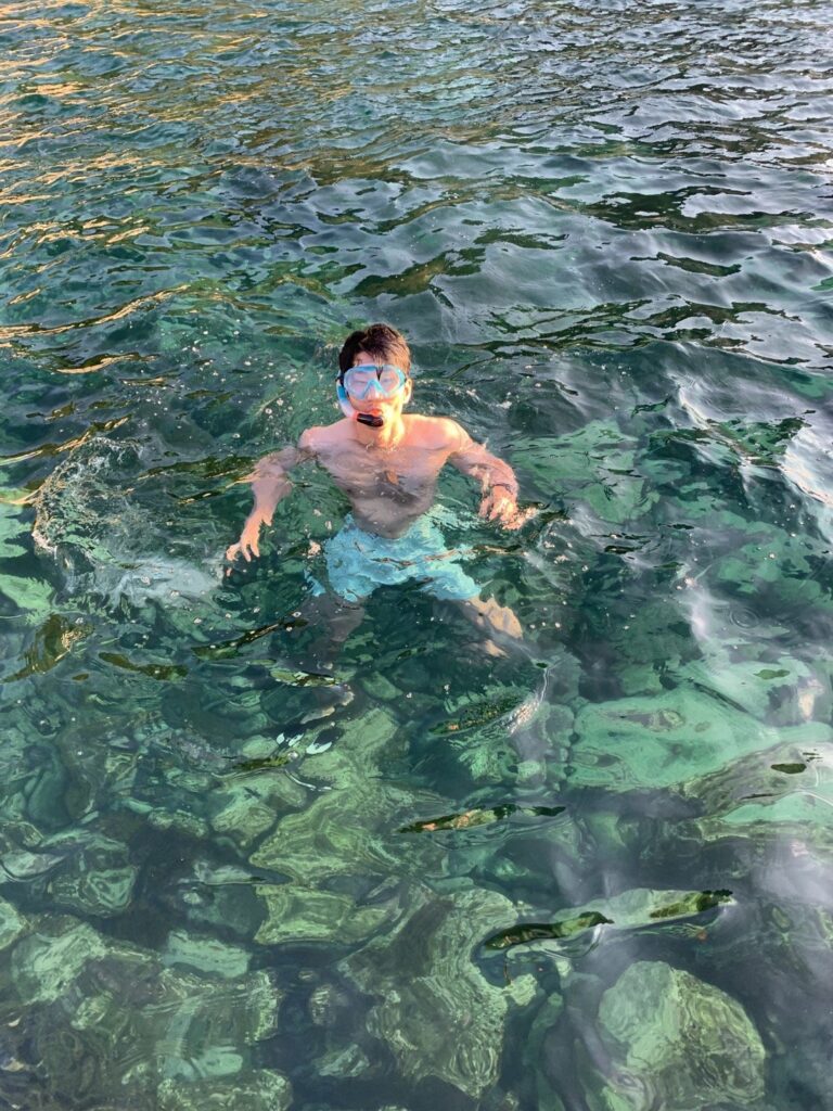 Snorkelling in clear green water on Ulleungdo