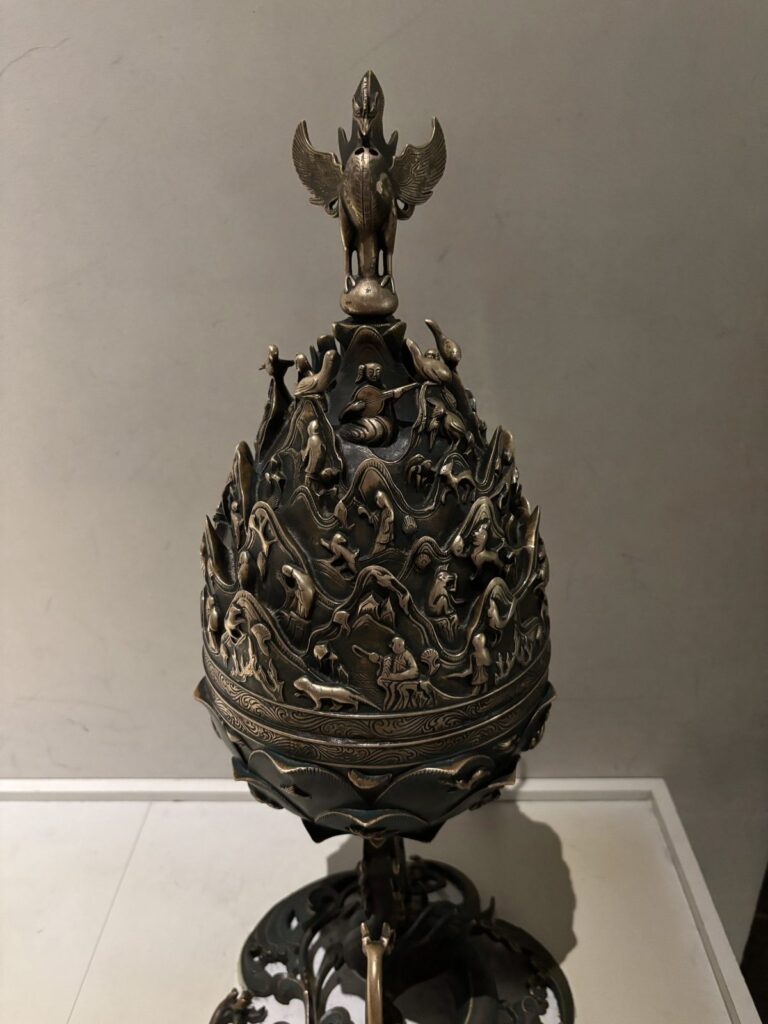 Close-up of the Baekje Gilt-bronze Incense Burner copy with a phoenix on top