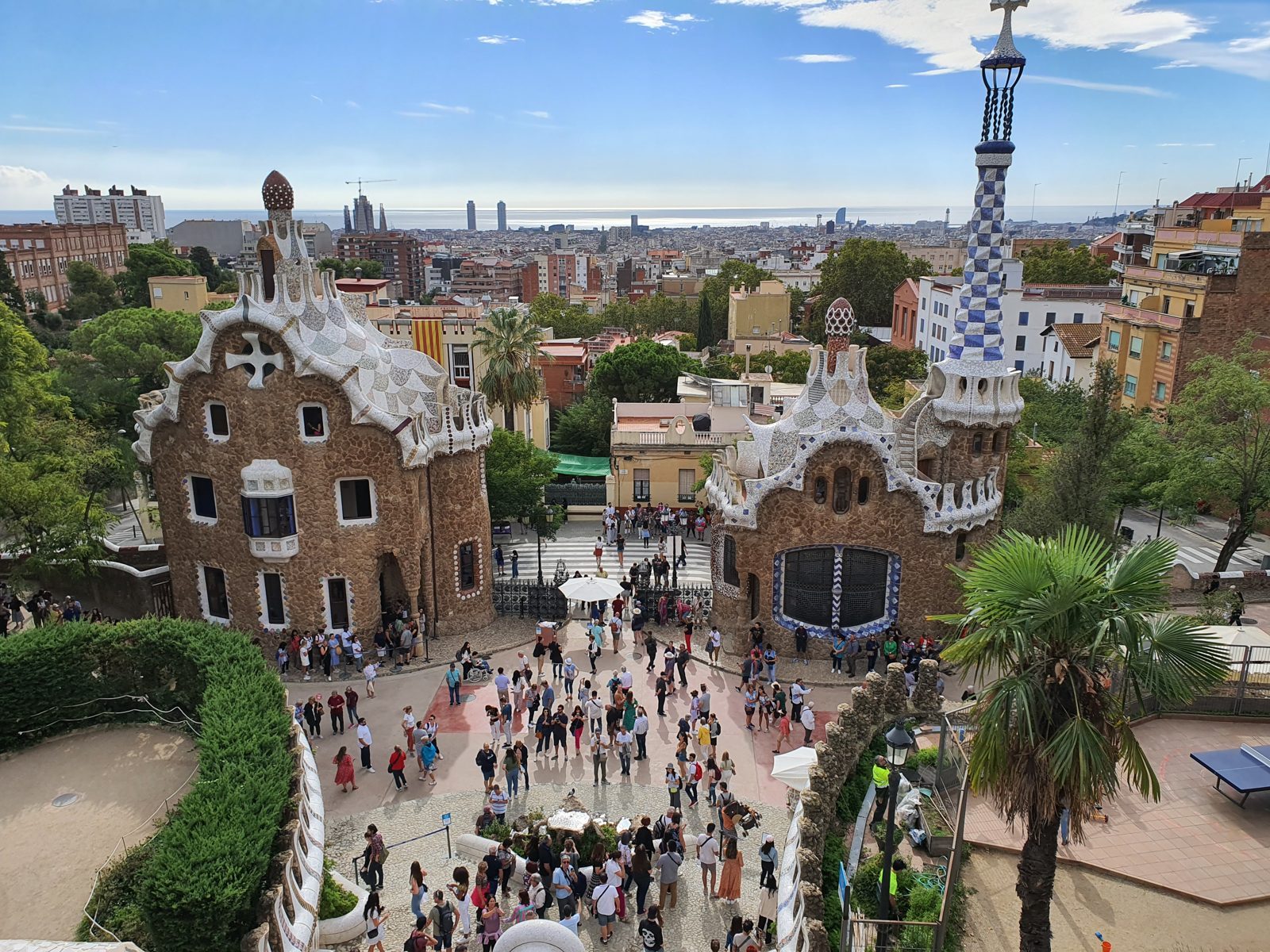 Park Güell gingerbread houses seen from above, with Barcelona behind