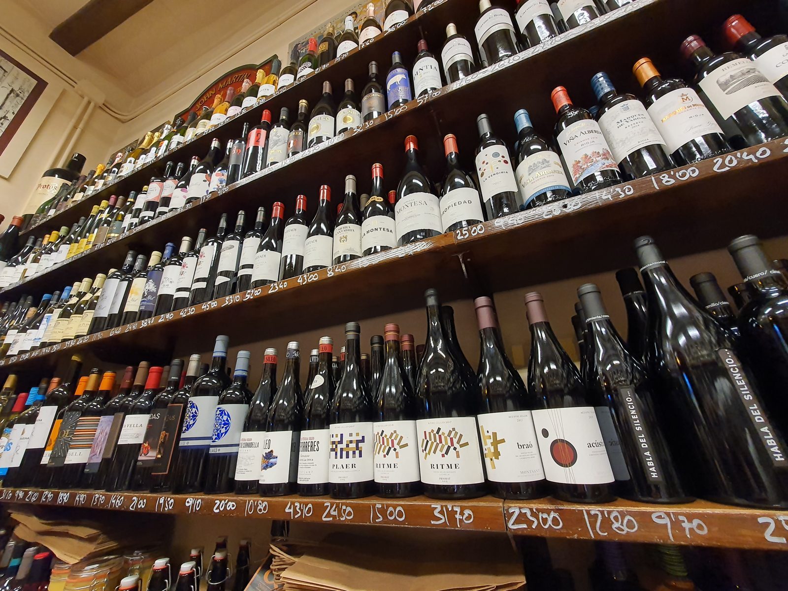 Wall of wine bottles at Quimet & Quimet in Poble-sec