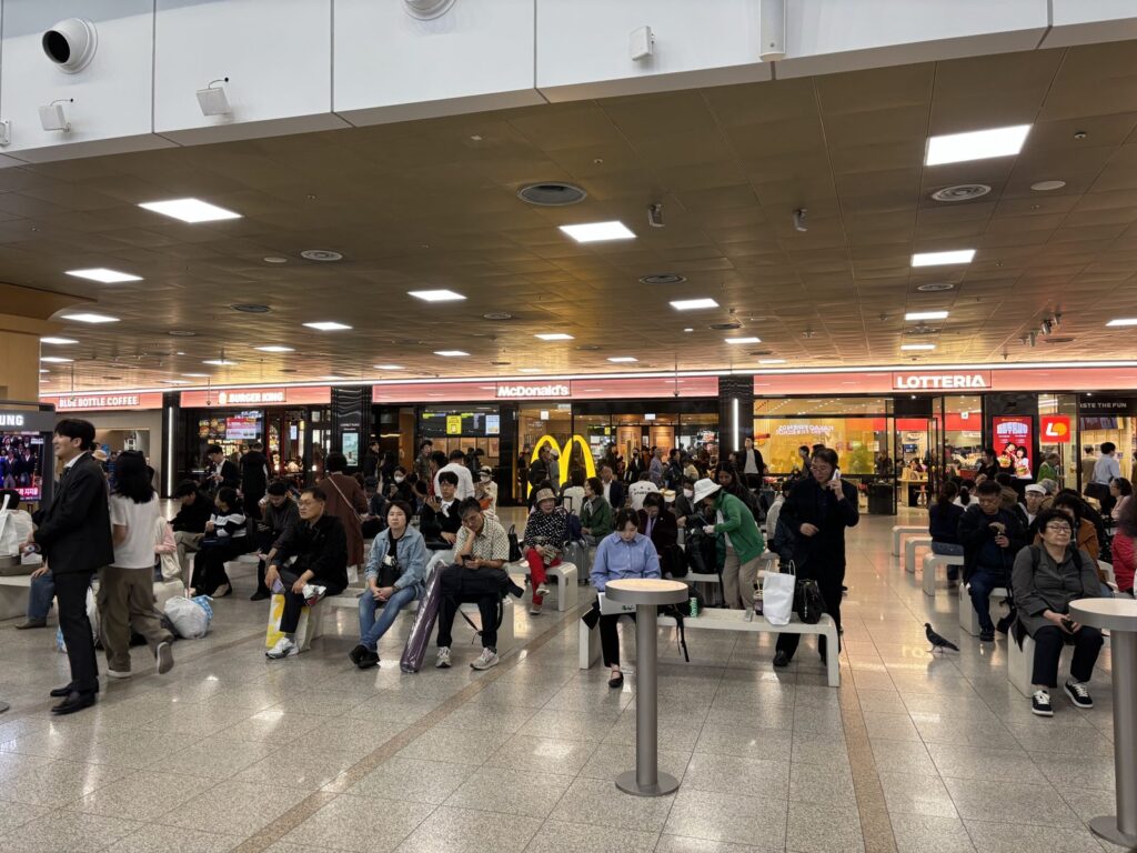 McDonald's, Burger King, Lotteria and Blue Bottle Coffee in a row at Seoul Station