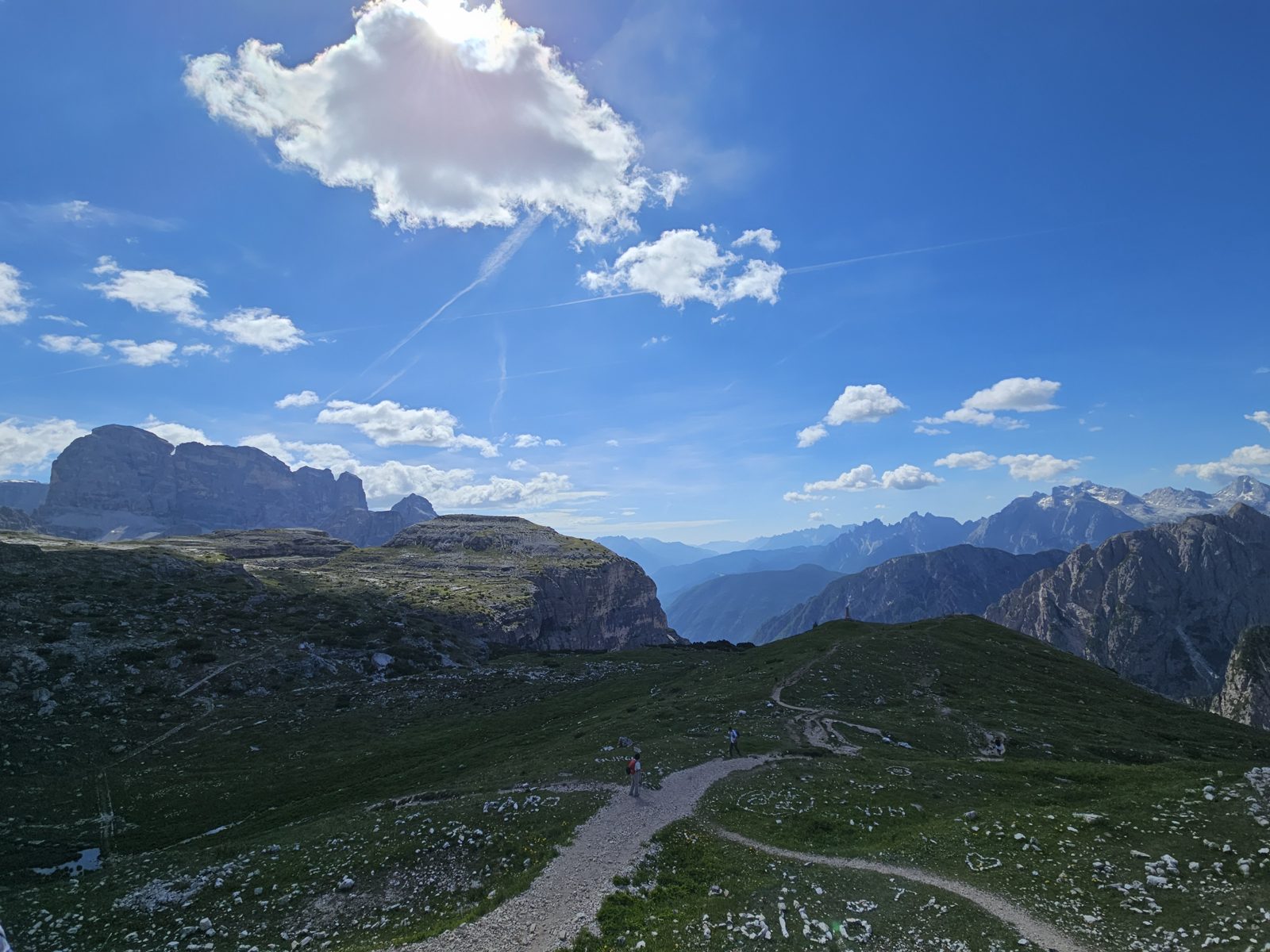 Gravel trail leading away from Rifugio Auronzo on the Tre Cime loop